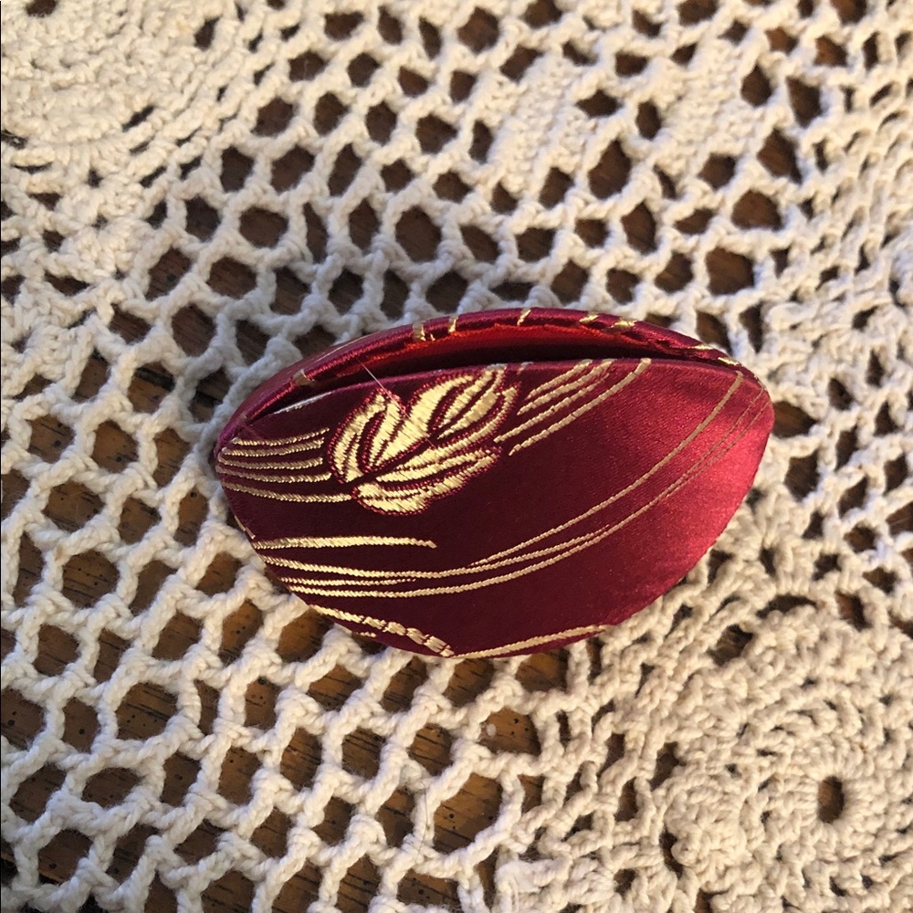 Vintage-Inspired Red and Gold Satin clam storage